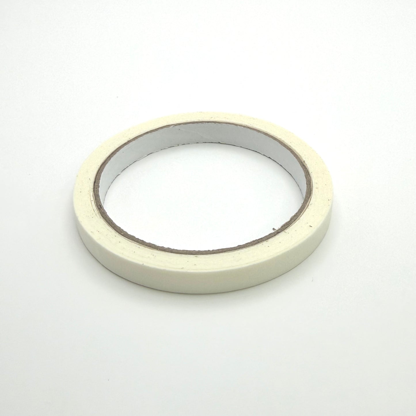 Roll of 10mm white tape on white background