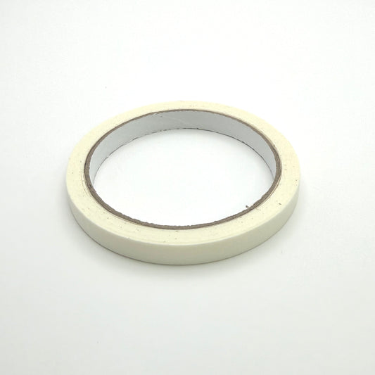 Roll of 10mm white tape on white background