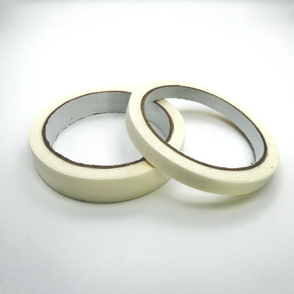 A roll of 10mm tape and a roll of 18mm tape on a white background