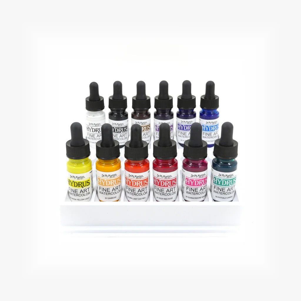Set of 12 bottles of Hydrus watercolor paint on a white background
