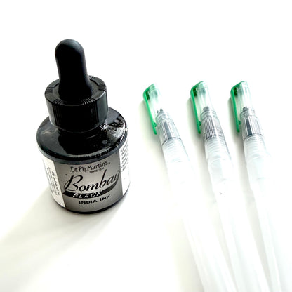 Bottle of Dr. Ph. Martin's Bombay Black India Ink with three water brush pens on a white background