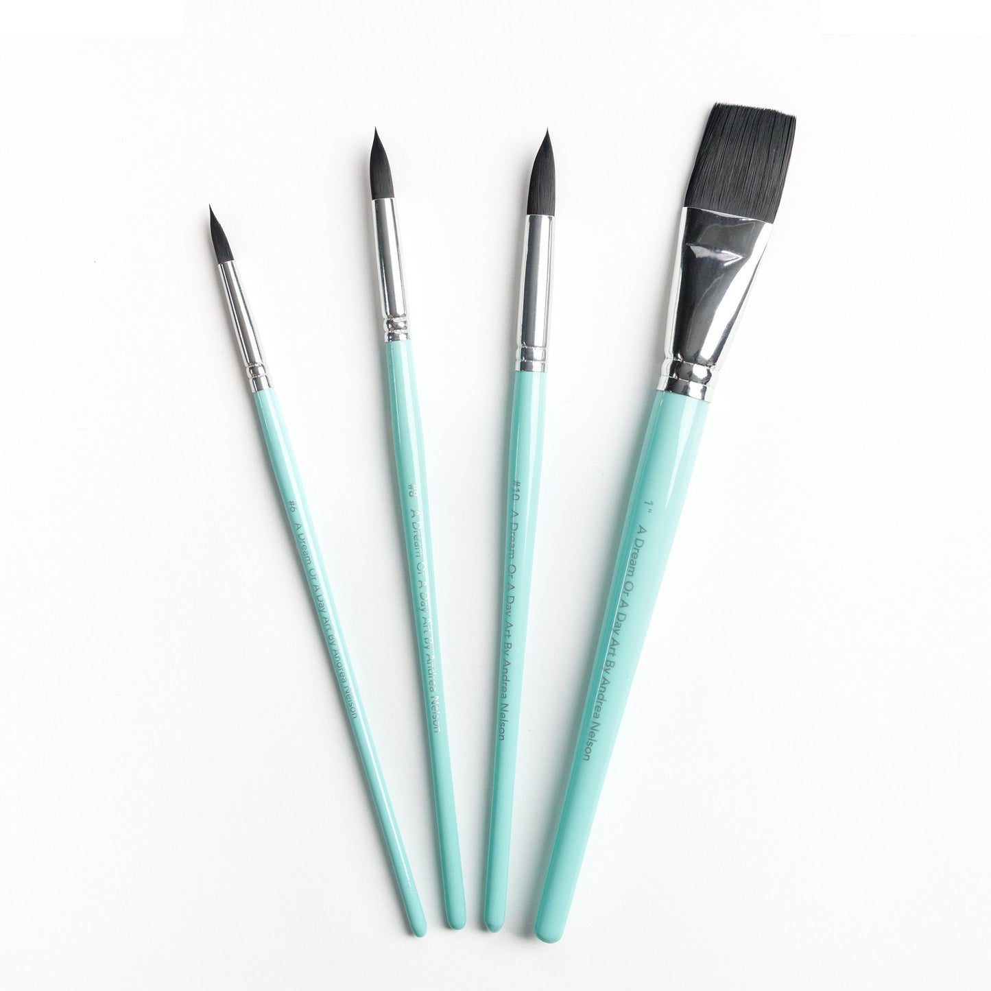 Four brushes including a Size 6 round brush, Size 8 round brush, Size 10 round brush, and 1 inch flat brush