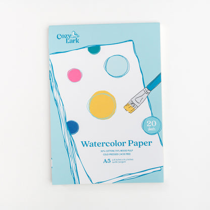 Cozy Lark A5 watercolor paper pad with colorful design on a white background