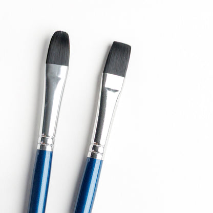 Close up of size 8 filbert and flat brushes