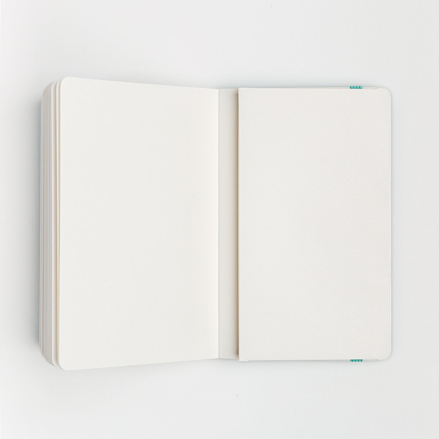 Watercolor sketchbook open to back cover inside pocket
