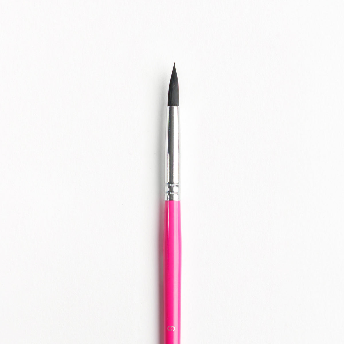 Close up of Size 6 Round brush with dark bristles, silver ferrule and bright pink handle