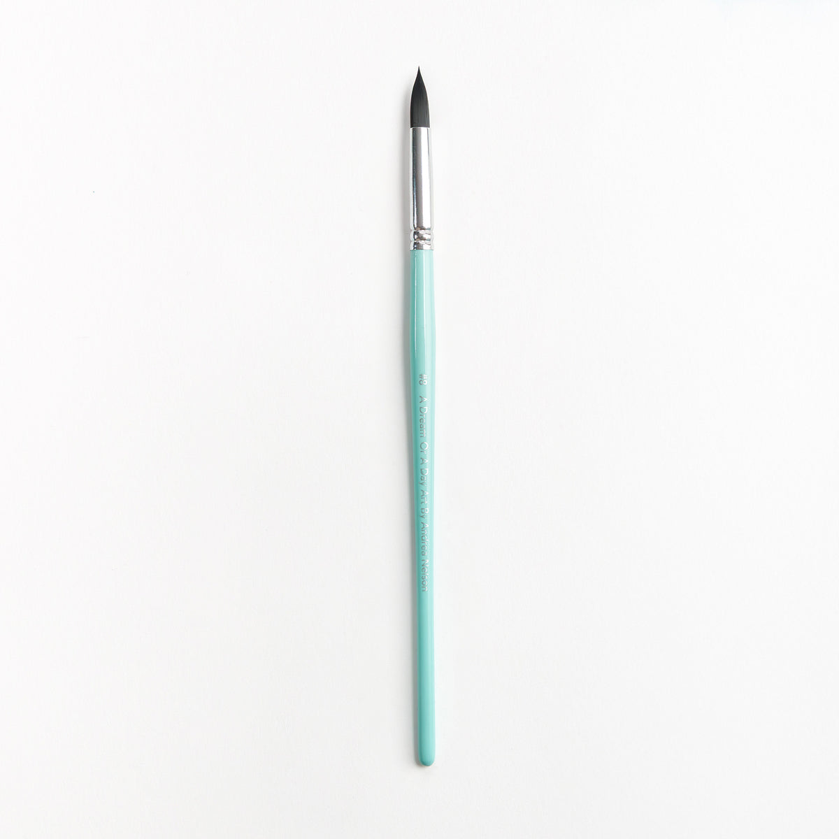 Size 8 round brush with light teal handle