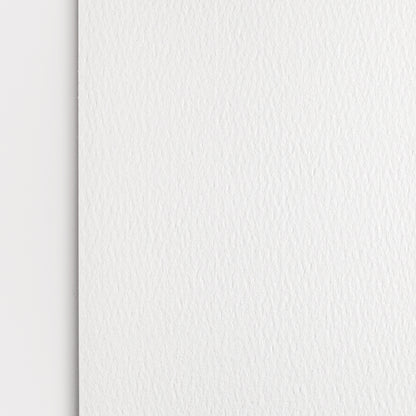 Detail close up of watercolor pad paper showing the paper texture and natural white color. 